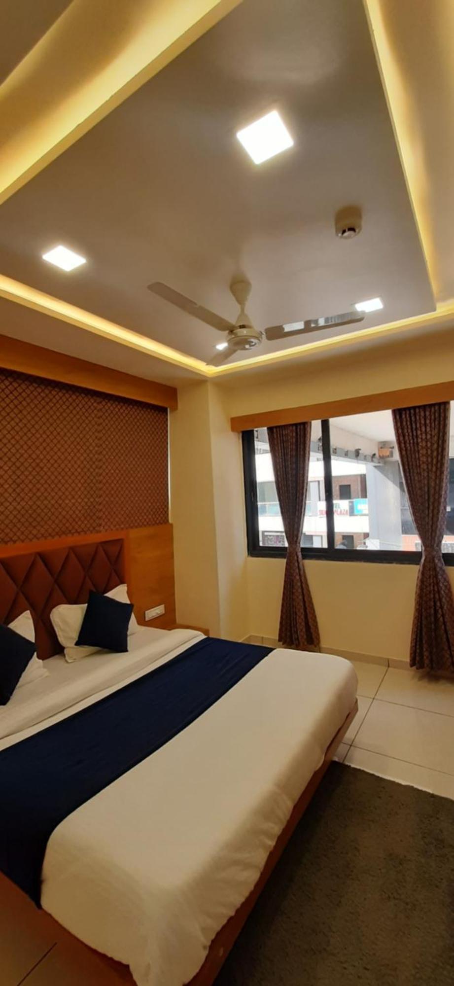 Hotel Suncity Ahmedabad Quarto foto